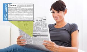 seated woman looking at advertisingments and notices in a newspaper My Classified Ads llc is one of the top agencies to place legal public noticew
